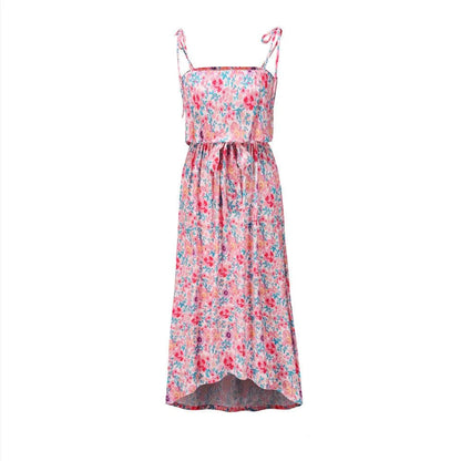 Printed camisole dress with a flattering mid-length swing skirt and a high-waisted design for a stylish, figure-enhancing look.