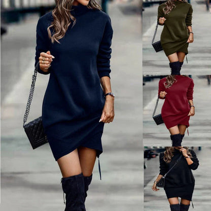 Elegant long sleeve midi dress in various colours, featuring a high neck design and waist cutout detail