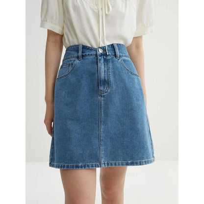 Chic high-waisted denim skirt in a classic blue shade, featuring an A-line silhouette and a flattering empire waistline.
