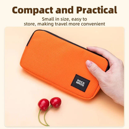 Compact cycling wallet in turquoise colour with zipper closure and compartments for storing phone, coins, and other small items