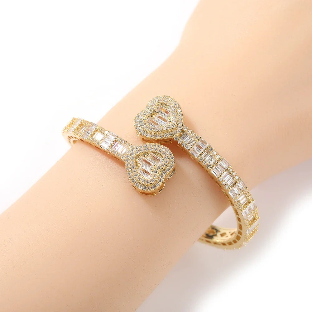 Elegant geometric bracelet with diamond accents in gold, silver, and rose gold finishes