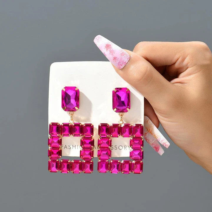 Pair of enchanting crystal earrings made with premium artificial crystals in various colours including rose red, green, pink, champagne, and black