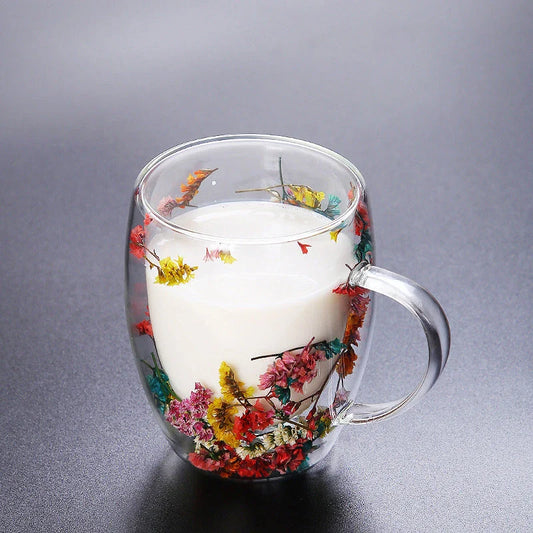 Elegant double-walled glass tea mug with a captivating floral design, ideal for hot and cold beverages