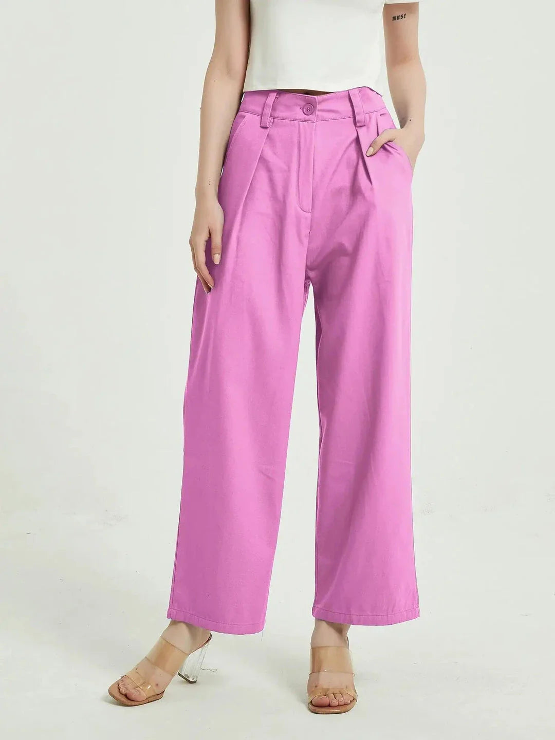Elegant purple high-waisted wide-leg trousers with a vintage-inspired design, perfect for the modern British woman