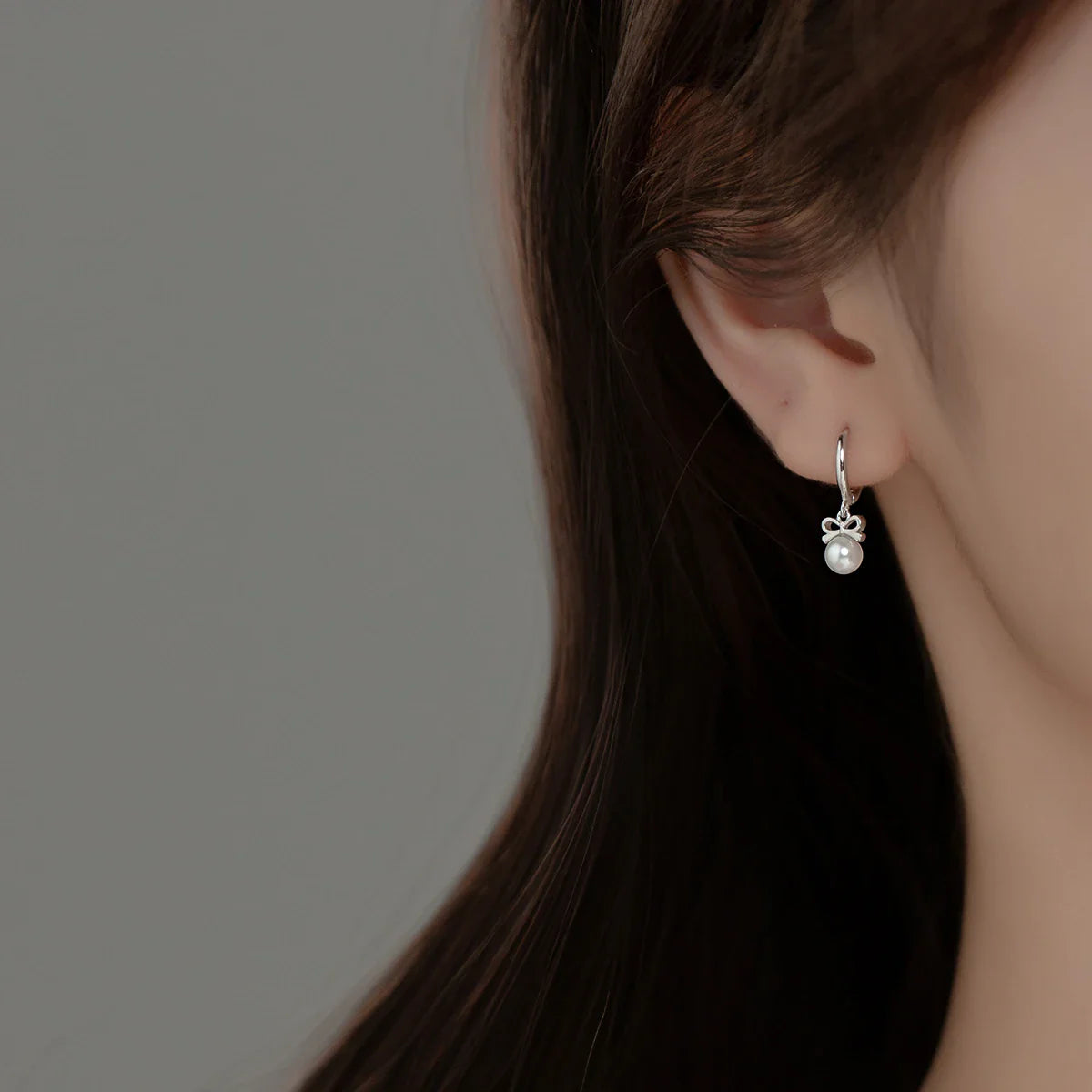 Elegant sterling silver earrings with a delicate butterfly design, inspired by Japanese and Korean fashion