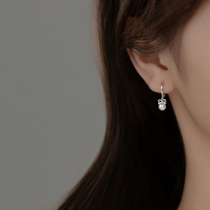 Elegant sterling silver earrings with a delicate butterfly design, inspired by Japanese and Korean fashion