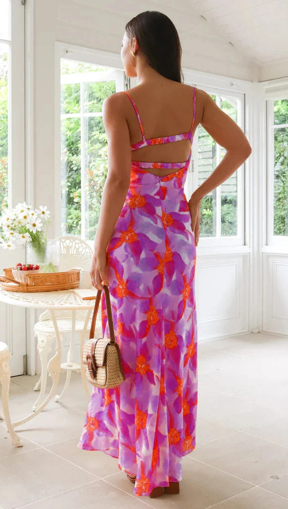 Elegant floral midi dress with backless design, available in yellow, purple, and green colours