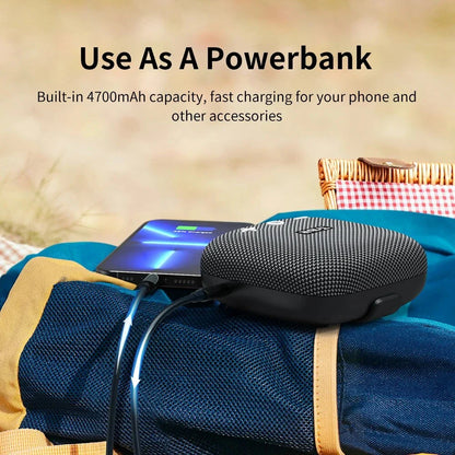 Portable Bluetooth speaker with powerful bass, IP67 waterproof rating, built-in power bank, and 12-hour battery life