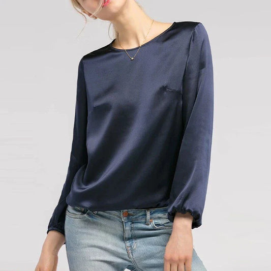 Elegant women's satin long sleeve blouse in dark blue colour with a relaxed yet refined silhouette