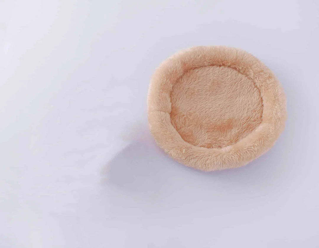 Luxurious plush bed for hamsters in camel and pink colours, with round shape and available in small and large sizes