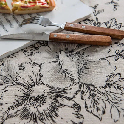 Elegant floral cotton linen round tablecloth with charming tassels, perfect for dining and home decor in the UK