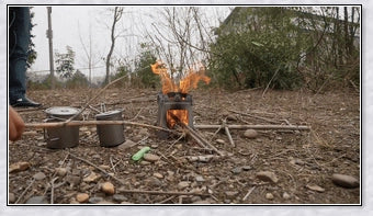 Compact titanium wood-fired camping stove with efficient air flow design and ultralight construction for easy portability
