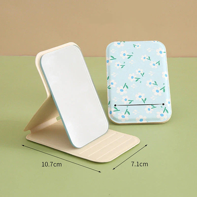 Elegant floral folding makeup mirror with a unique design and clear, distortion-free reflection