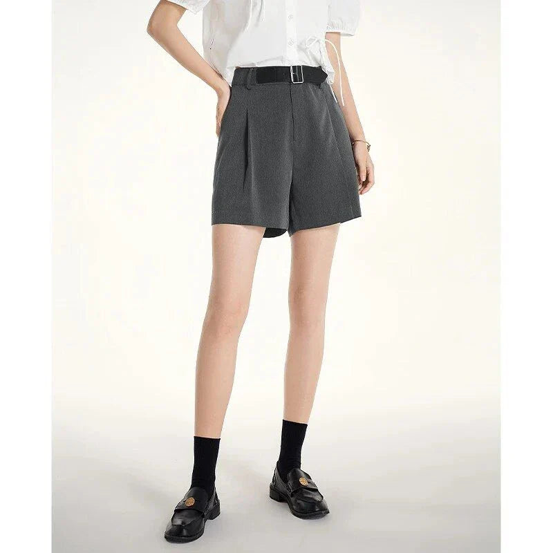 Elegant, high-waist harem shorts for women in the UK, featuring a relaxed, flowing silhouette and practical details for comfortable, stylish summer wear.