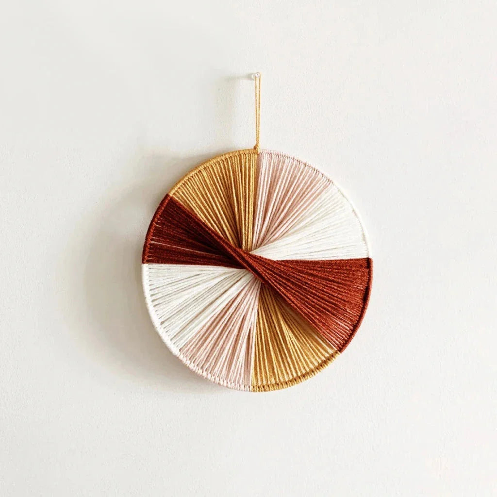Colourful handcrafted macrame wall hanging made with premium cotton threads, adding bohemian charm to any room