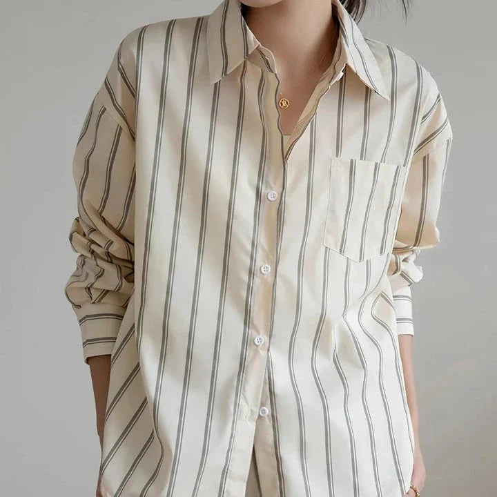 Elegant striped office blouse with chic drop shoulder design, made from premium polyester-cotton blend for durability and comfort