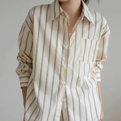 Elegant striped office blouse with chic drop shoulder design, made from premium polyester-cotton blend for durability and comfort