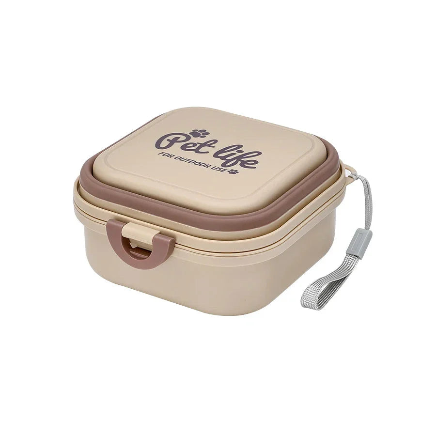 Portable double-decker foldable travel bowl for dogs and cats, featuring separate compartments for food and water, durable plastic construction, and a compact, collapsible design for easy transport.