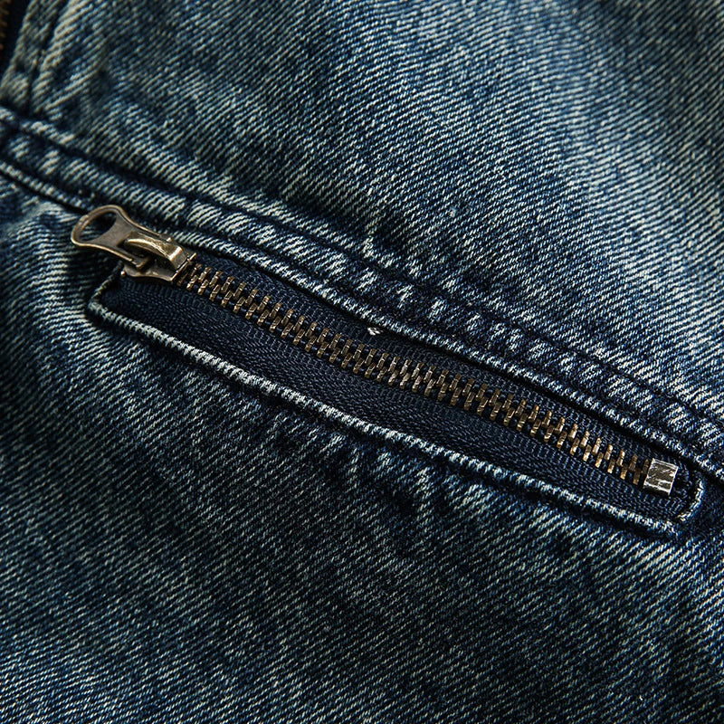 Retro-inspired men's denim jacket with intricate embroidered detailing, perfect for casual and smart-casual outfits