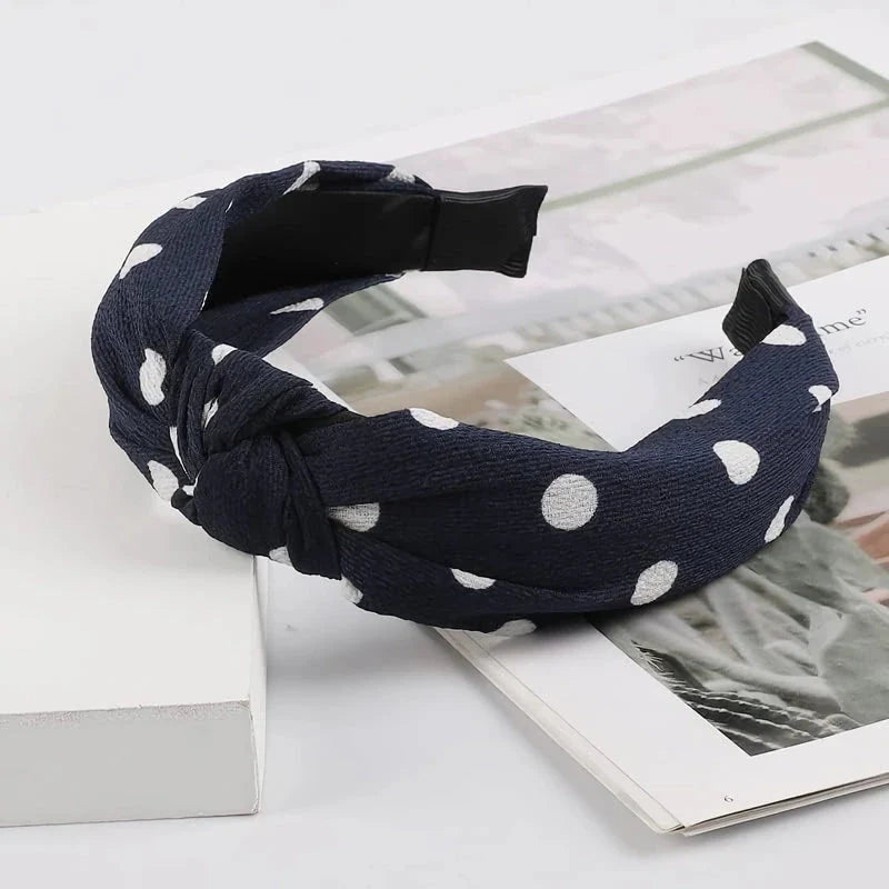 Elegant wide-brimmed fabric hair hoop headband with a stylish Korean-inspired knotting design and a versatile wide-brimmed structure