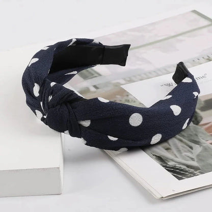 Elegant wide-brimmed fabric hair hoop headband with a stylish Korean-inspired knotting design and a versatile wide-brimmed structure