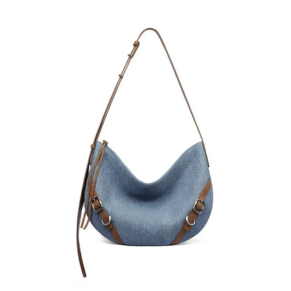 Elegant leather shoulder and crossbody bag for women, featuring a spacious main compartment, interior zip pocket, and contemporary design