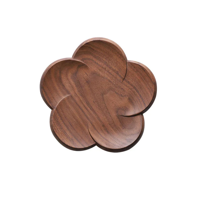 Set of elegant Japanese-inspired walnut wood flower coasters with unique textures and natural variations
