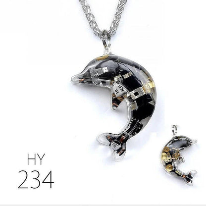 Steampunk-inspired dolphin pendant necklace with electronic components and brass accents