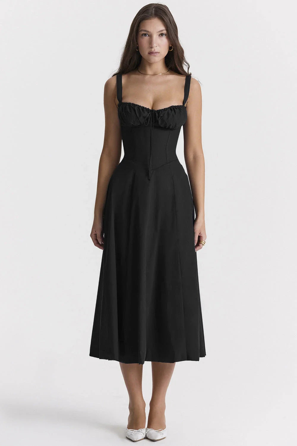 A stylish suspender dress made of premium polyester with a French high-split design, available in a range of vibrant solid colours for versatile summer wear.