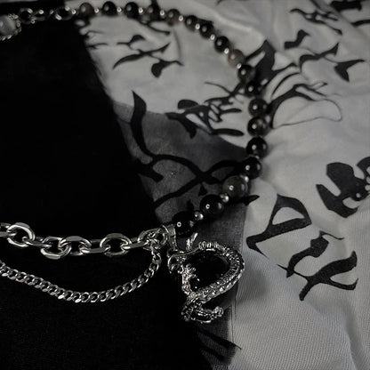 Black agate dragon pendant necklace made of titanium steel with adjustable chain and elegant design