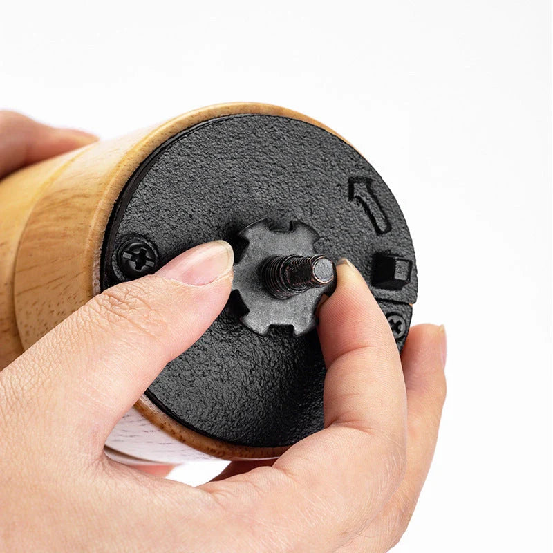 Elegant wooden manual coffee grinder with steel conical burr for consistent, flawless grinding