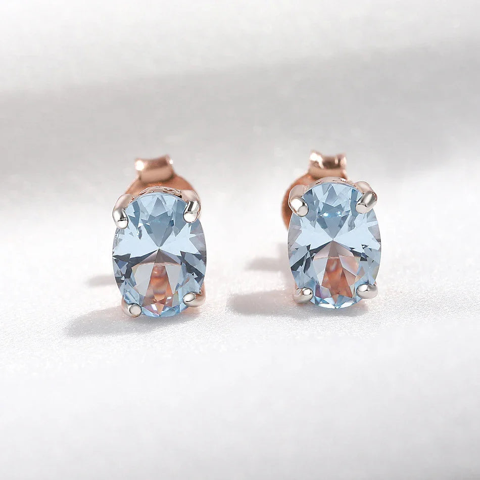 Pair of rose gold-plated sterling silver earrings with a minimalist, geometric design
