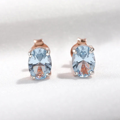 Pair of rose gold-plated sterling silver earrings with a minimalist, geometric design