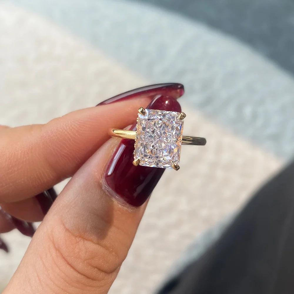 Elegant 4-Claw S925 Sterling Silver Zircon Ring with a quadrilateral setting and radiant zircon centre stone