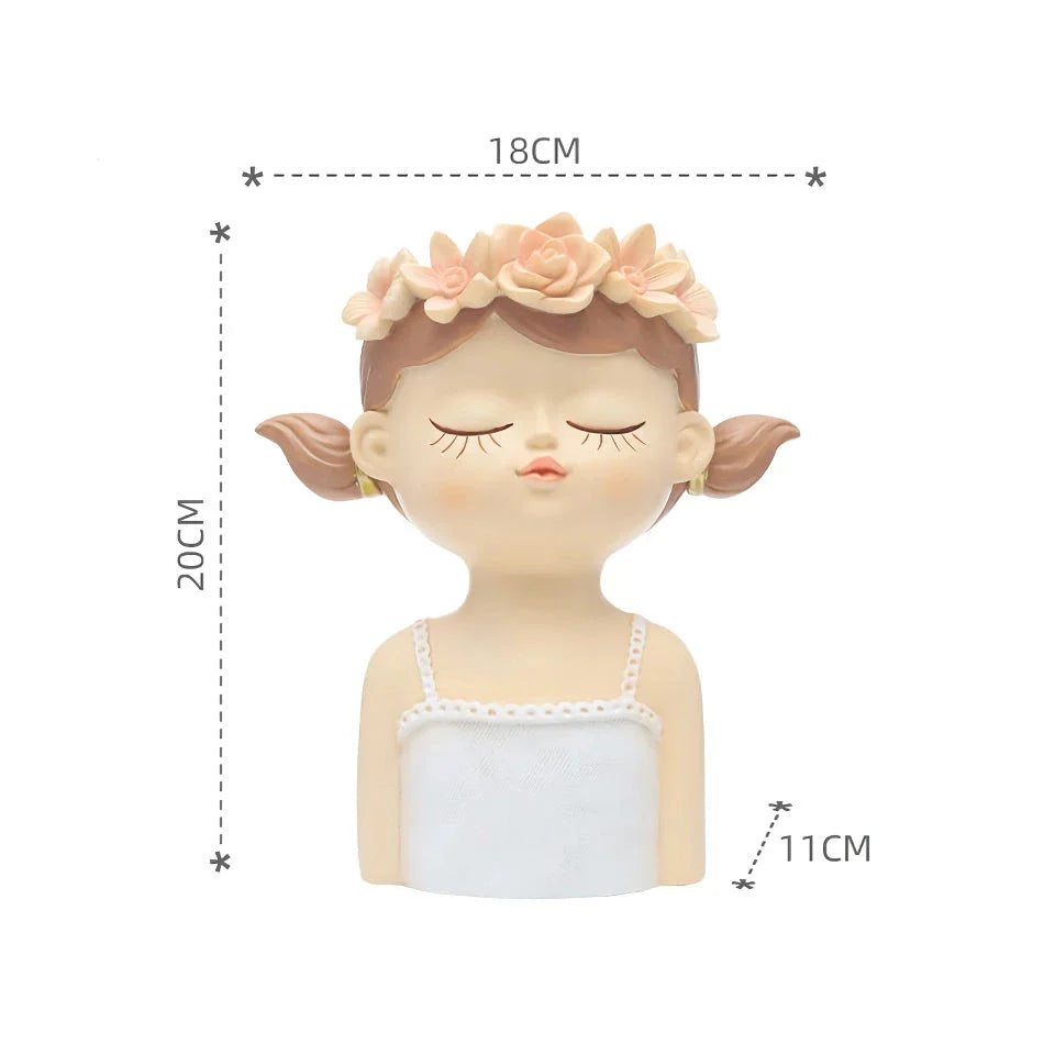 A charming 7.8-inch resin planter in the shape of a fairy girl, perfect for displaying succulents and adding whimsical decor to your home or office.