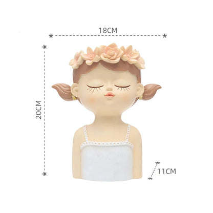 A charming 7.8-inch resin planter in the shape of a fairy girl, perfect for displaying succulents and adding whimsical decor to your home or office.