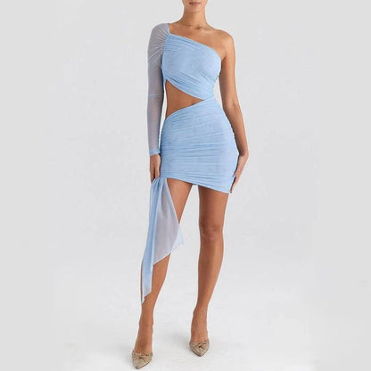 Elegant backless mini dress with sheer mesh overlay, perfect for spring and summer events in the UK