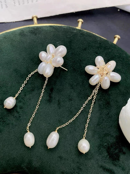 Elegant freshwater pearl necklace with intricate butterfly, dragonfly, and insect-inspired design on a copper-plated 14K gold chain