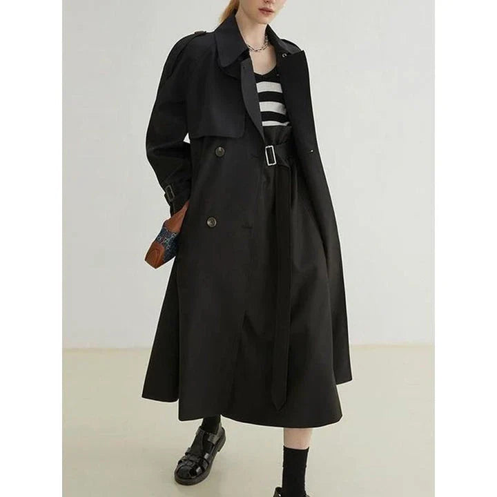 Elegant spliced ruffle trench coat for women in khaki colour, featuring premium cotton-polyester blend, stylish ruffles, and flattering wide-waisted fit