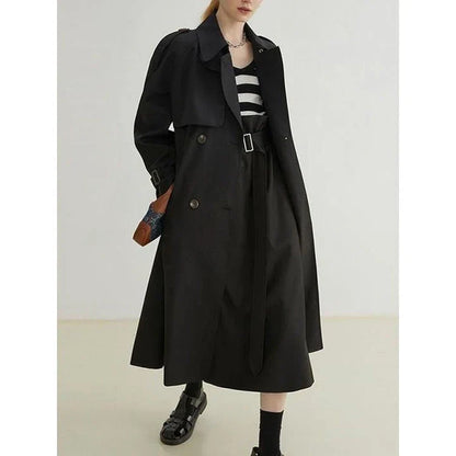 Elegant spliced ruffle trench coat for women in khaki colour, featuring premium cotton-polyester blend, stylish ruffles, and flattering wide-waisted fit