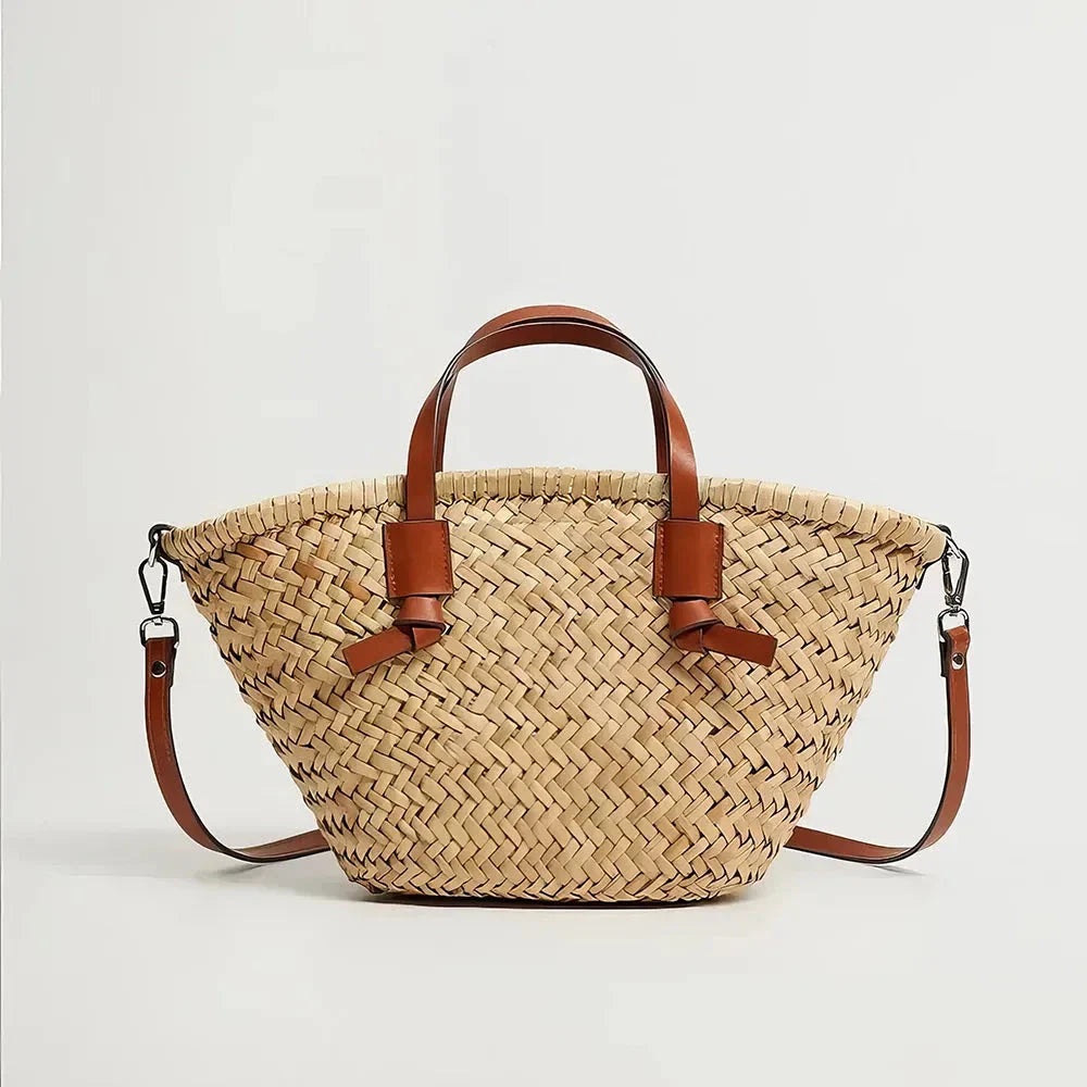 Elegant woven wicker basket bag in brown, perfect for summer adventures and carrying essentials