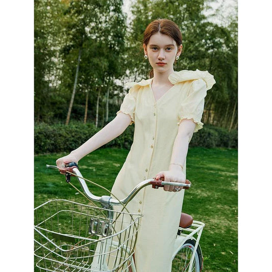 Elegant navy blue sailor collar dress with delicate fungus-edged sleeves, versatile and stylish for summer events