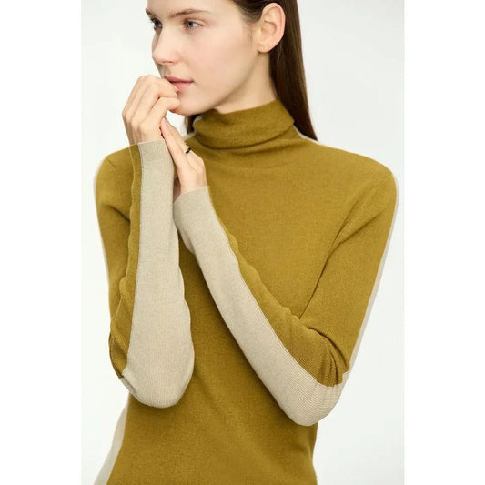 A cosy and stylish turtleneck sweater with a unique patchwork design, made from a premium wool blend for exceptional comfort and elegance.