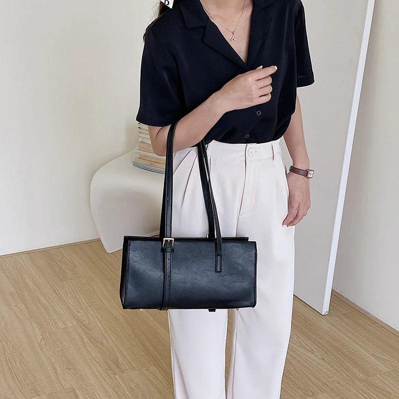 A premium polyester tote bag in a variety of colours, featuring a stylish Japanese and Korean-inspired design for the modern British shopper.