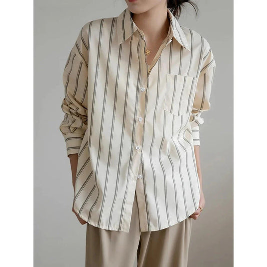 Elegant striped office blouse with chic drop shoulder design, made from premium polyester-cotton blend for durability and comfort