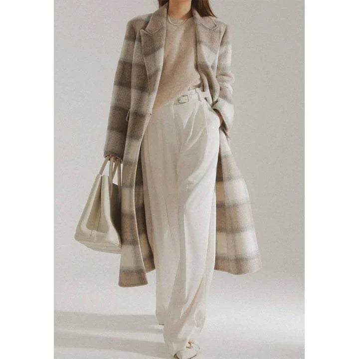 Elegant plaid double-breasted long woollen coat for women, featuring a premium blend of wool, cotton and polyester for exceptional quality and warmth.