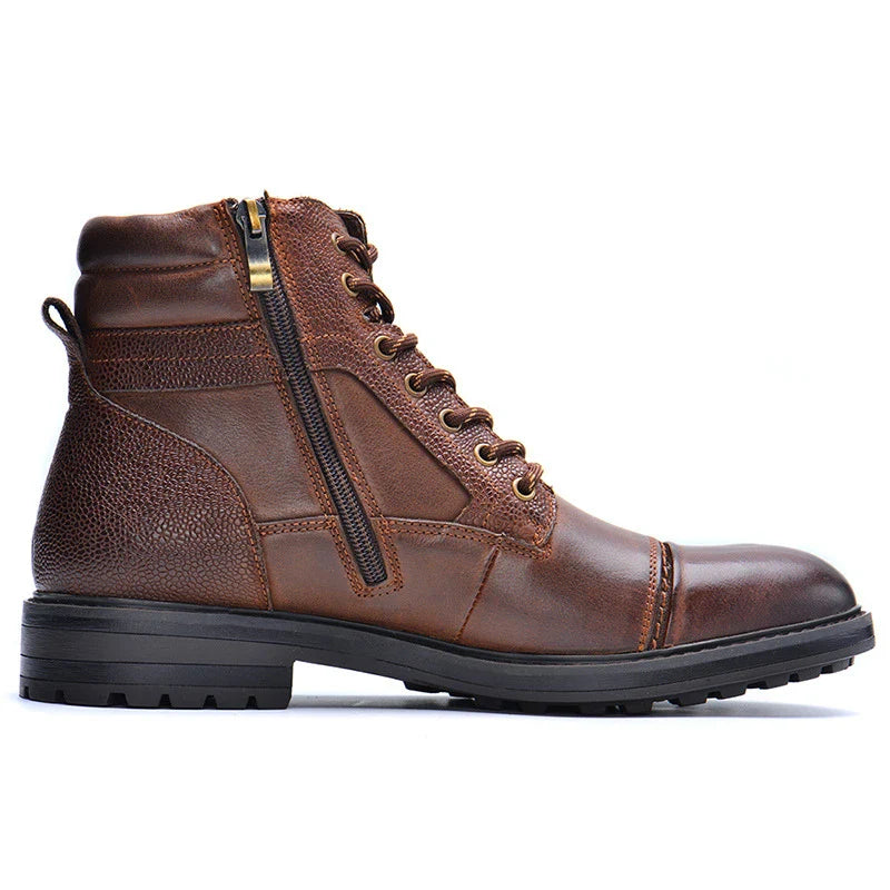 A pair of durable, stylish cowhide leather men's boots in a classic British design
