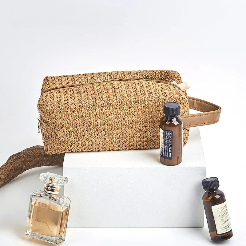 Elegant straw cosmetic bag with unique knitting pattern, ideal for organizing makeup and toiletries