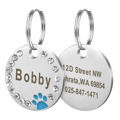 Customisable stainless steel pet ID tags in various colours, designed for identifying and protecting your beloved companion