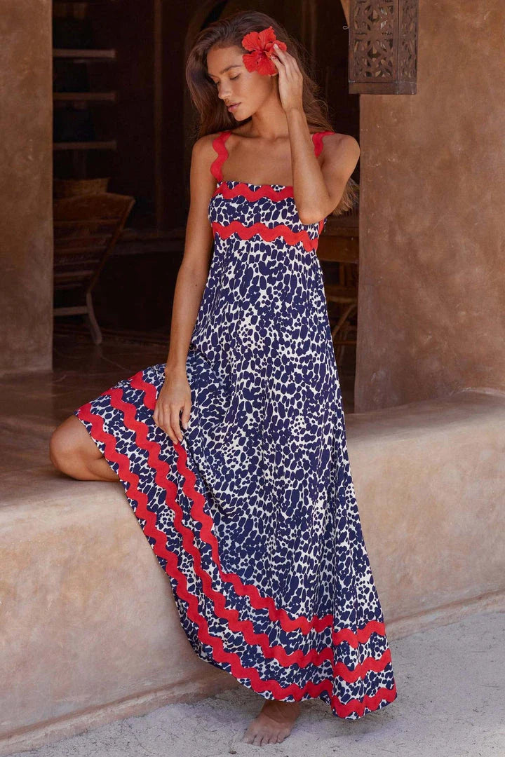Elegant floral print suspender midi dress in black, perfect for summer beach holidays in the UK
